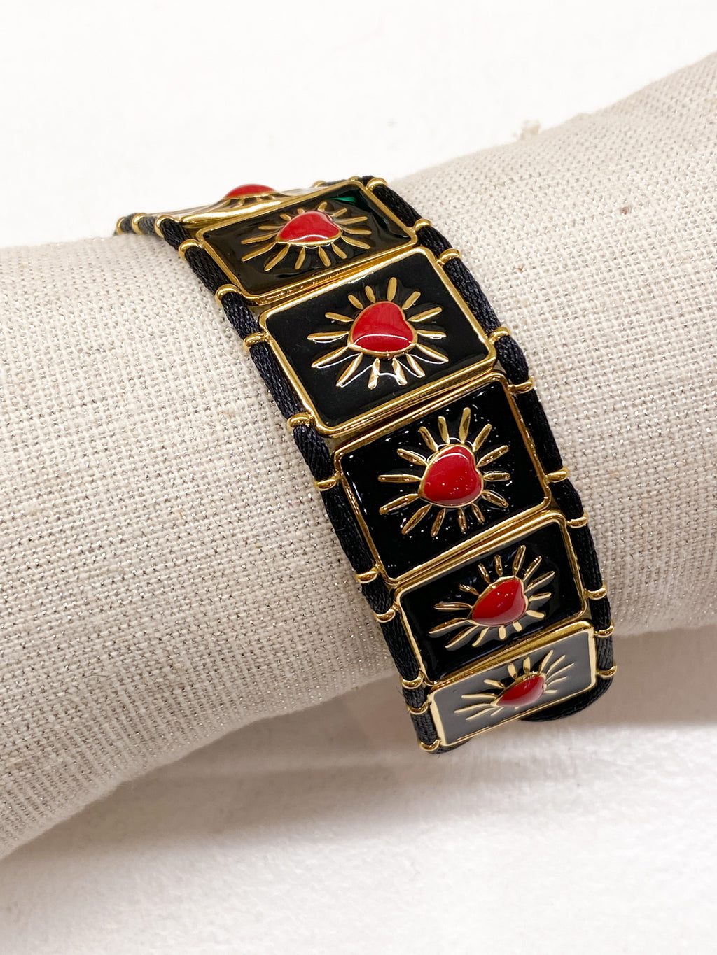 Bracelet doré avec plaques émaillées marron et cœur orange