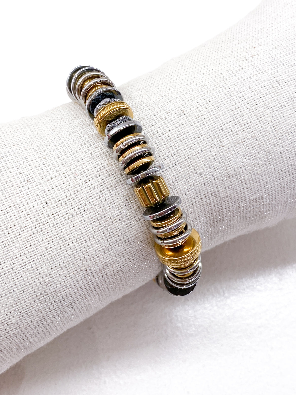 Bracelet femme en acier inoxydable doré et argenté aux formes graphiques