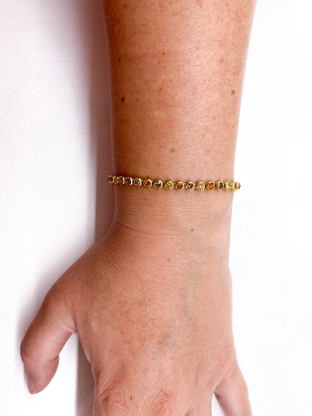 Bracelet fin doré en acier inoxydable à strass ronds