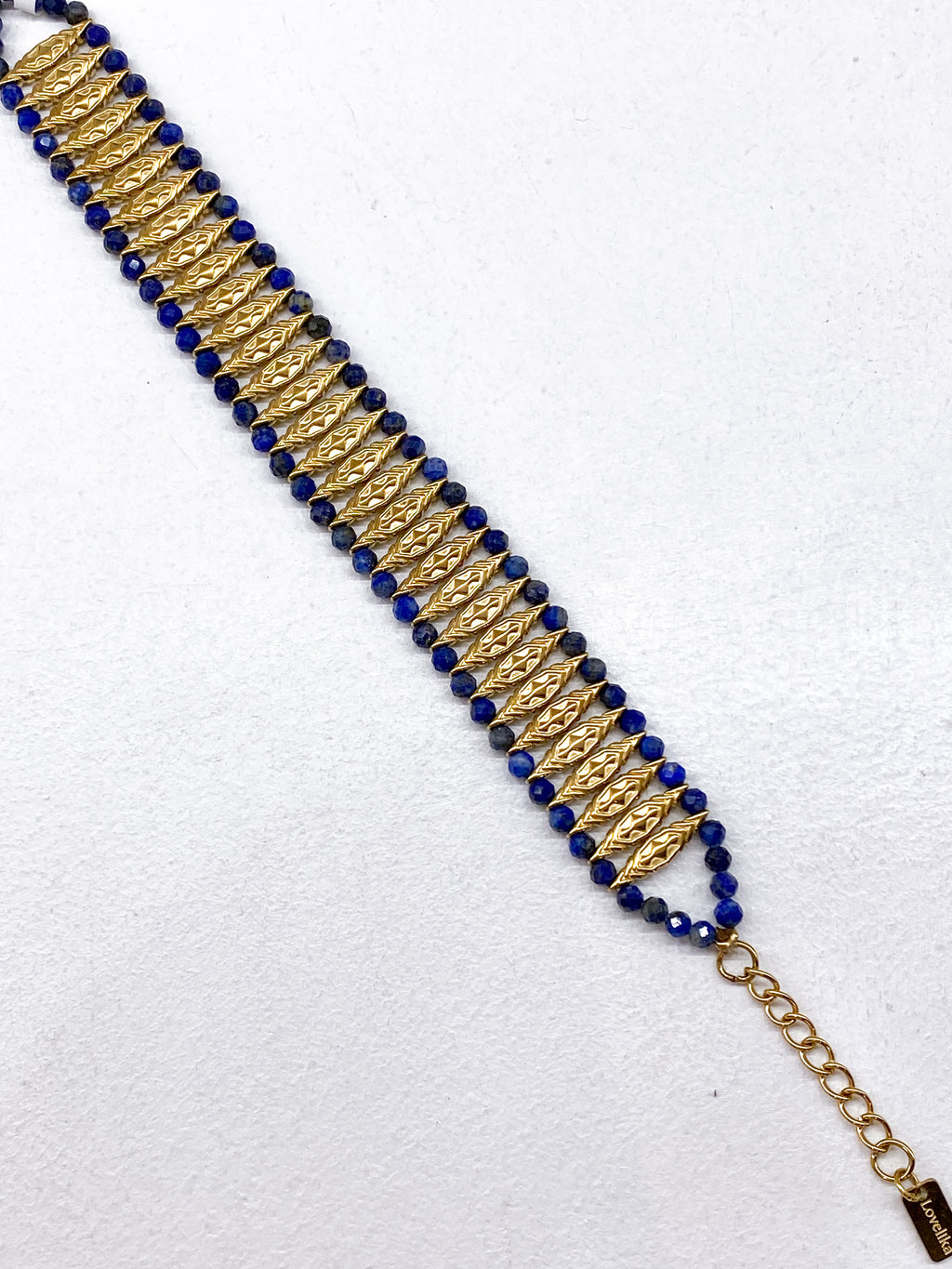 Bracelet manchette losanges dorés avec lapis-lazuli