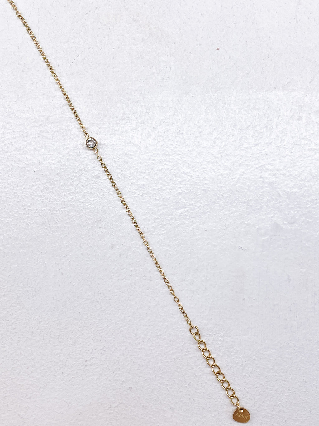 Bracelet délicat en acier inoxydable avec strass central