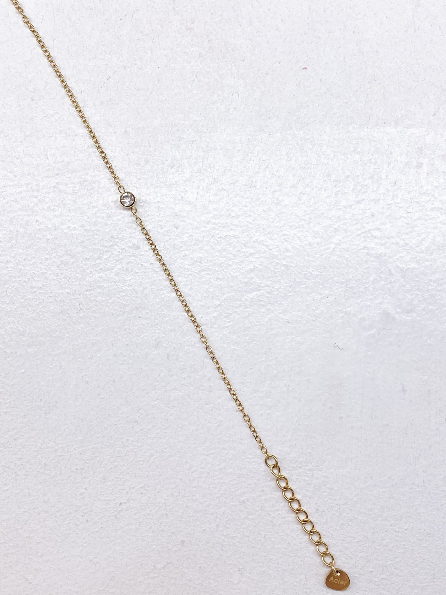Bracelet délicat en acier inoxydable avec strass central