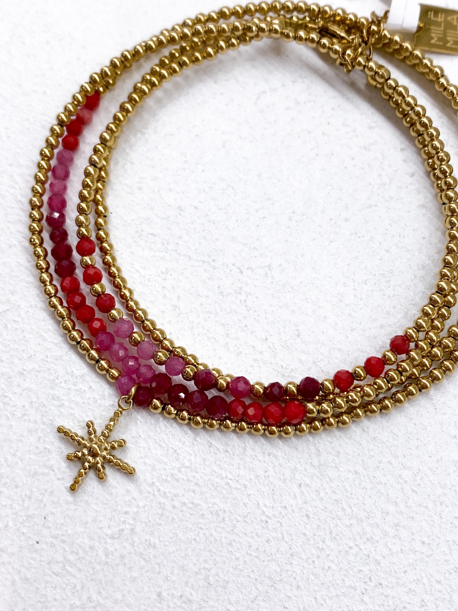 Bracelet étoile dorée et perles à 4 tours en plusieurs couleurs