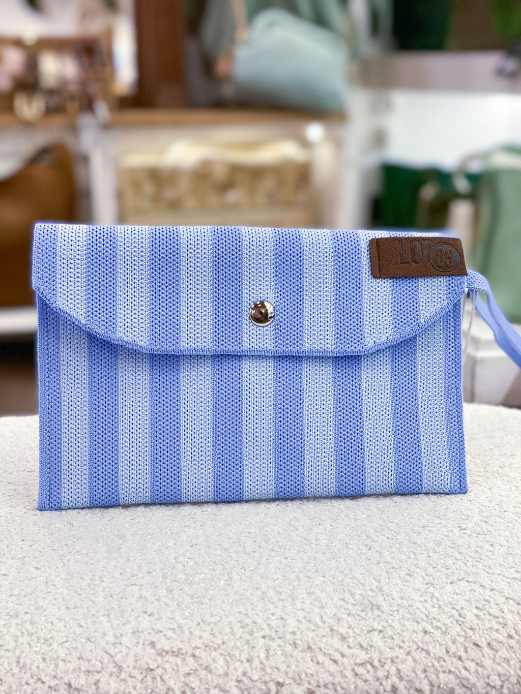 Portefeuille femme rectangulaire rayé en tissu tressé