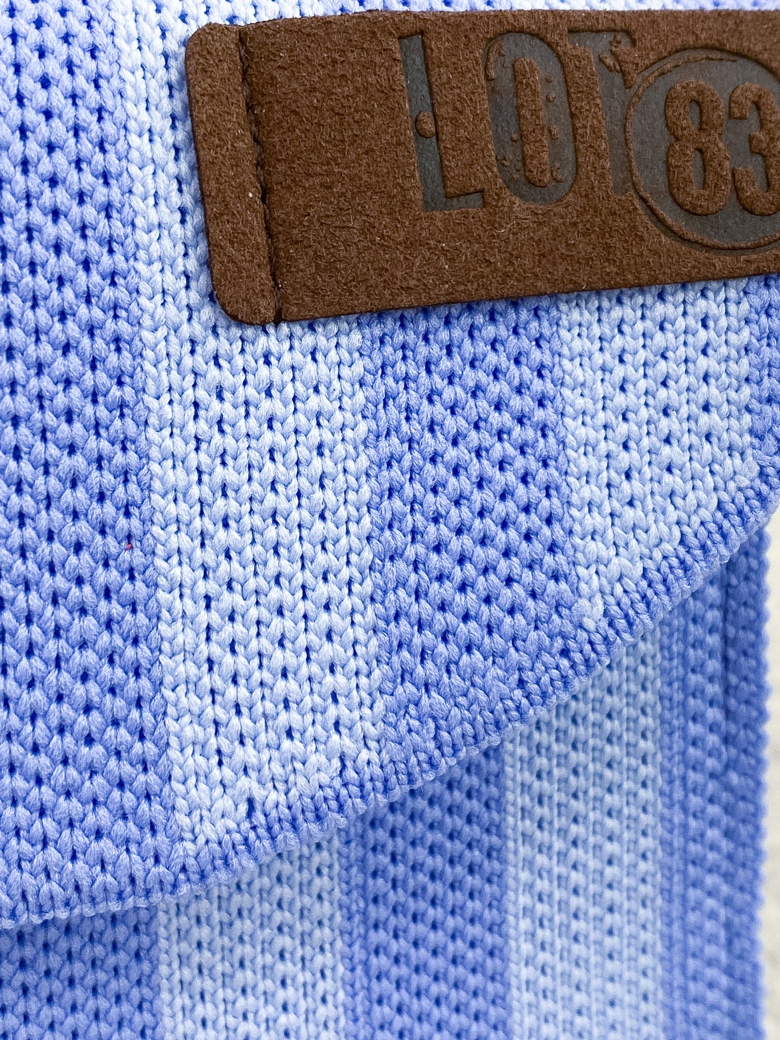 Portefeuille femme rectangulaire rayé en tissu tressé
