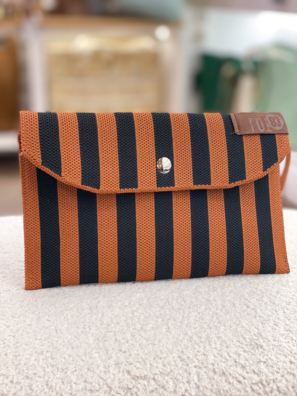 Portefeuille femme rectangulaire rayé en tissu tressé