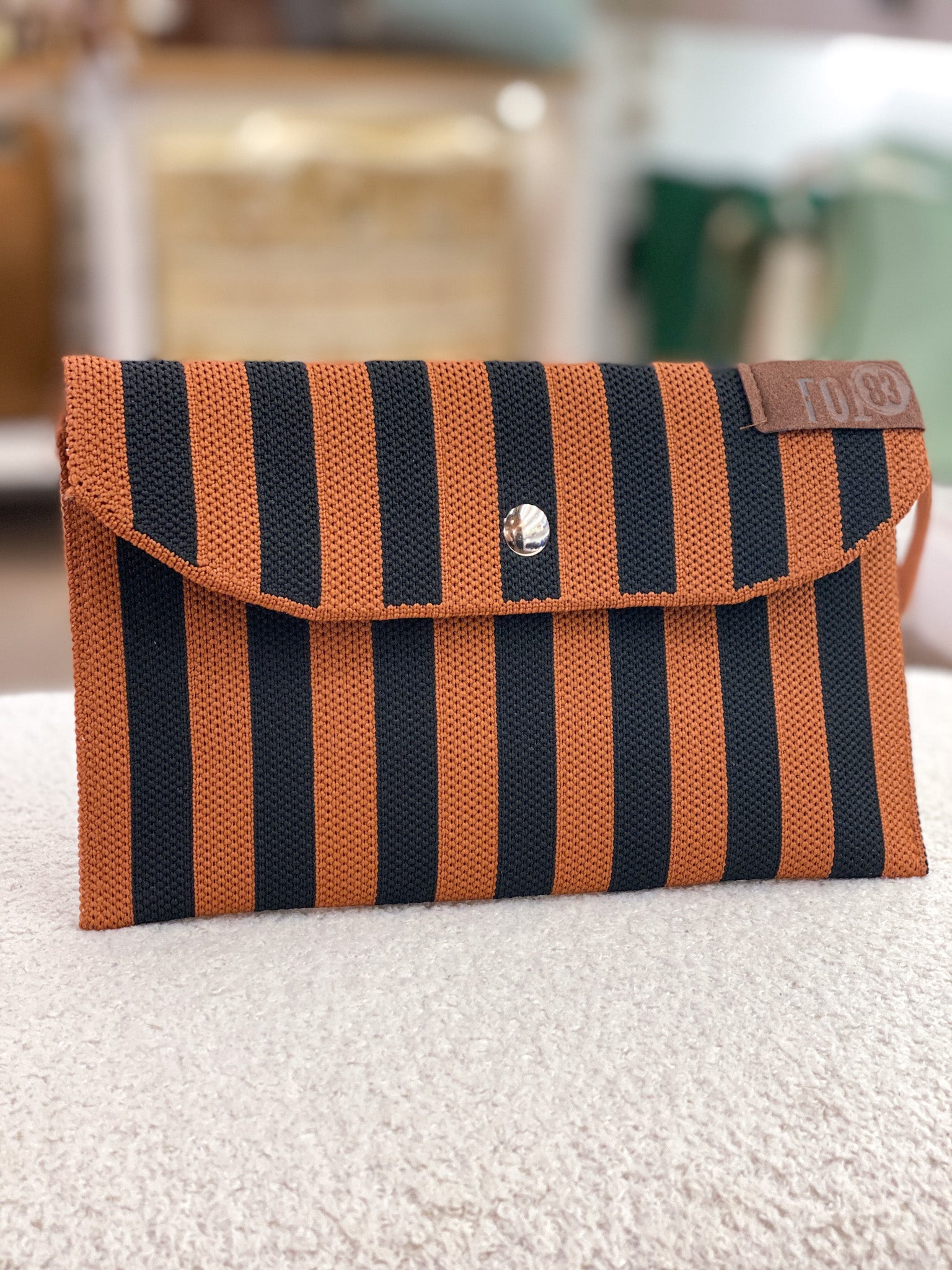 Portefeuille femme rectangulaire rayé en tissu tressé