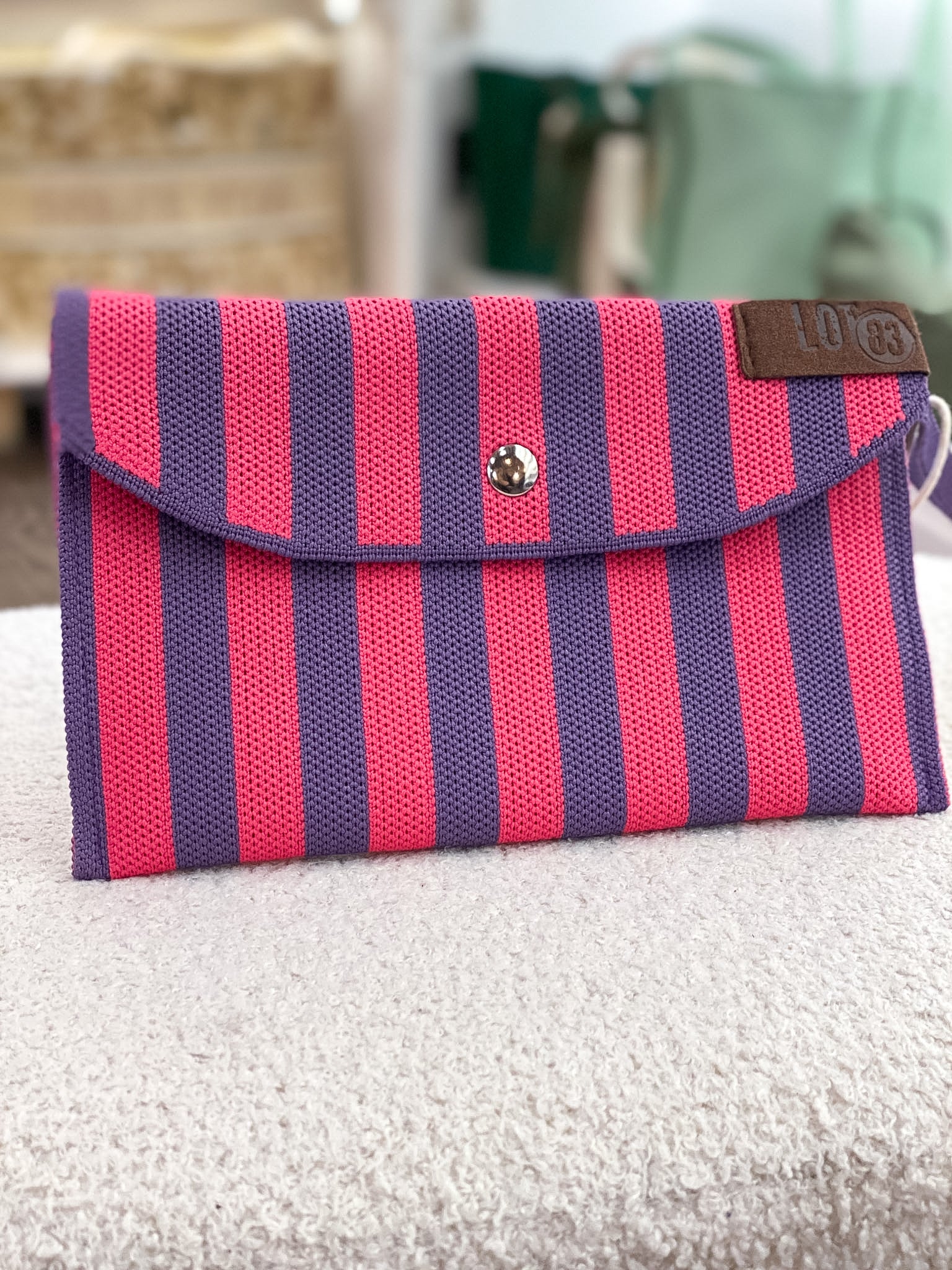 Portefeuille femme rectangulaire rayé en tissu tressé