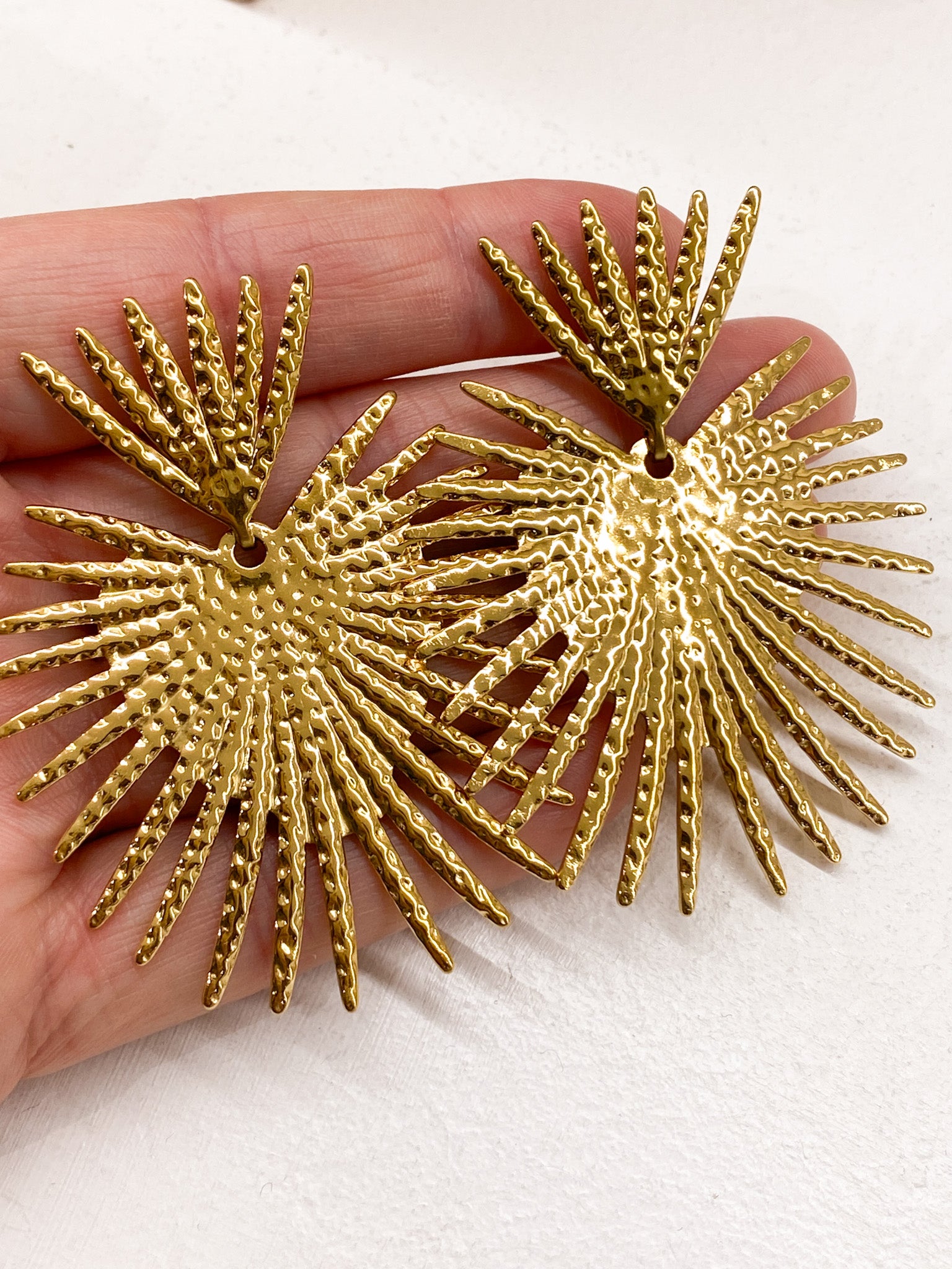 Boucles d’oreilles cœur royal dorées et argentées