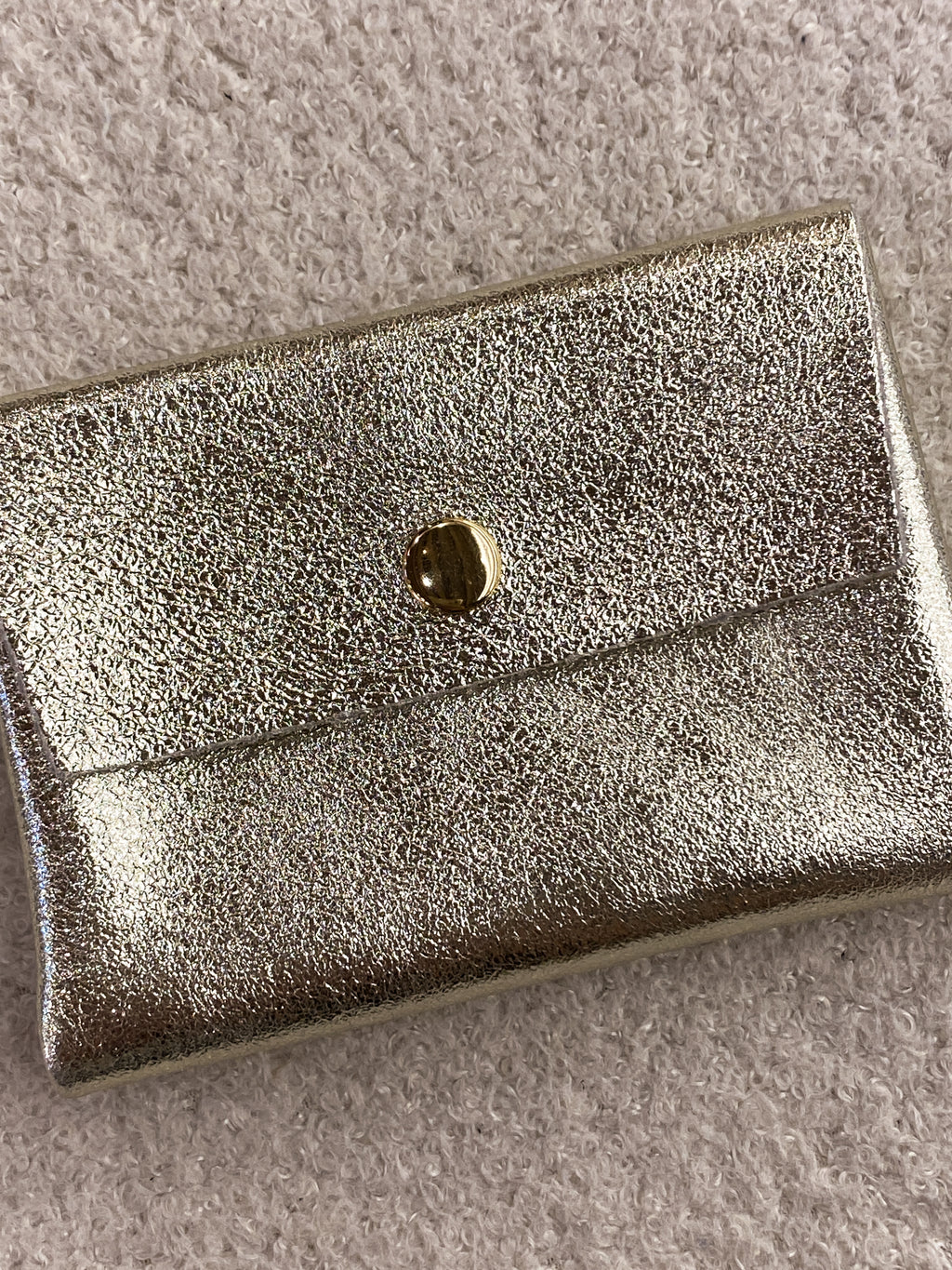 Porte-monnaie doré en cuir irisé