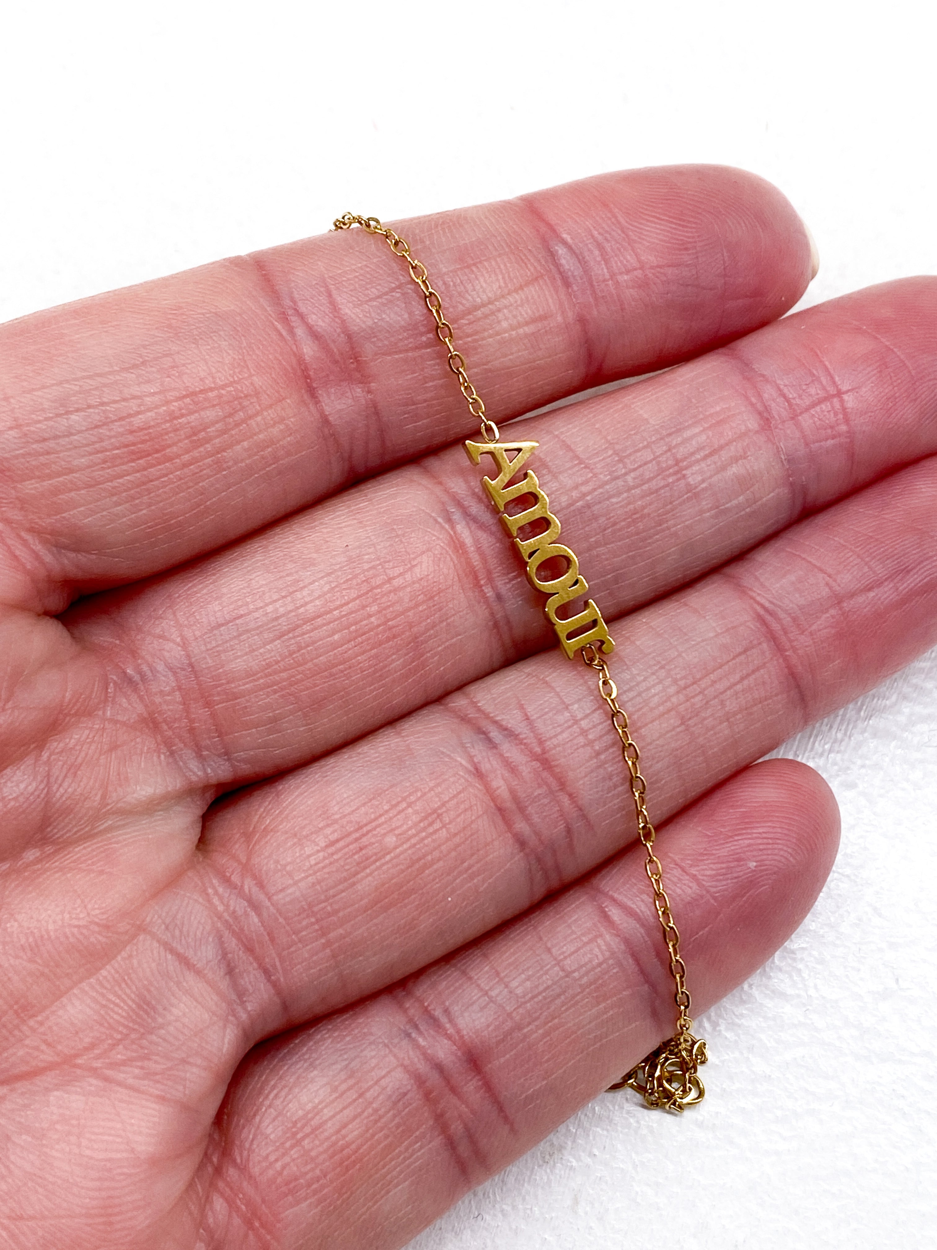 Bracelet fin Amour en acier inoxydable doré