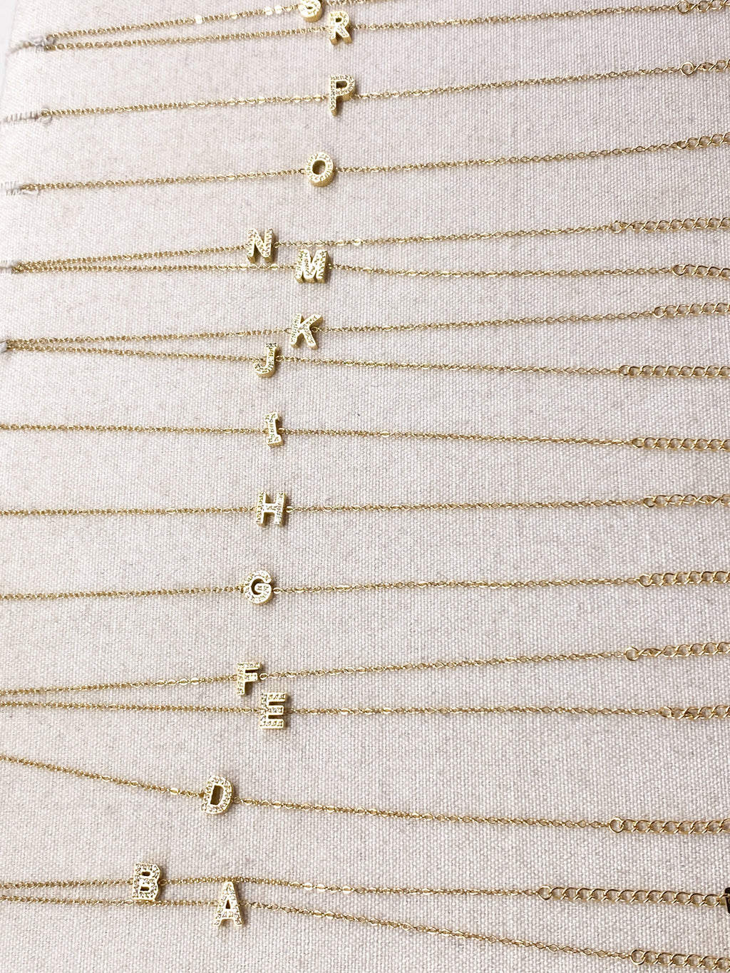Bracelet A-Z lettre initiale acier inoxydable doré strass