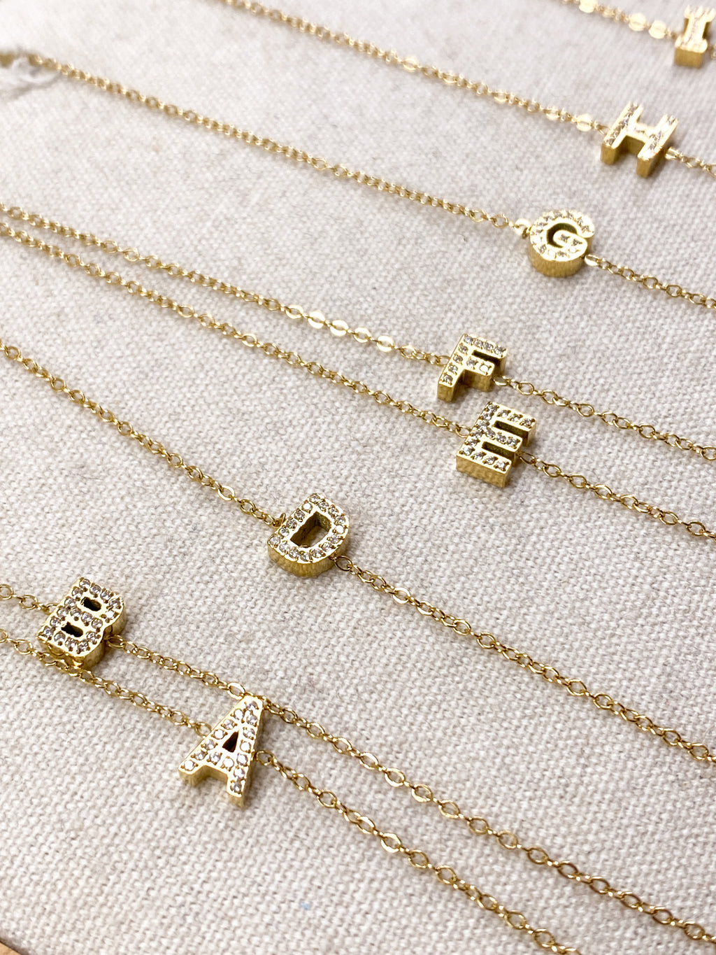 Bracelet A-Z lettre initiale acier inoxydable doré strass