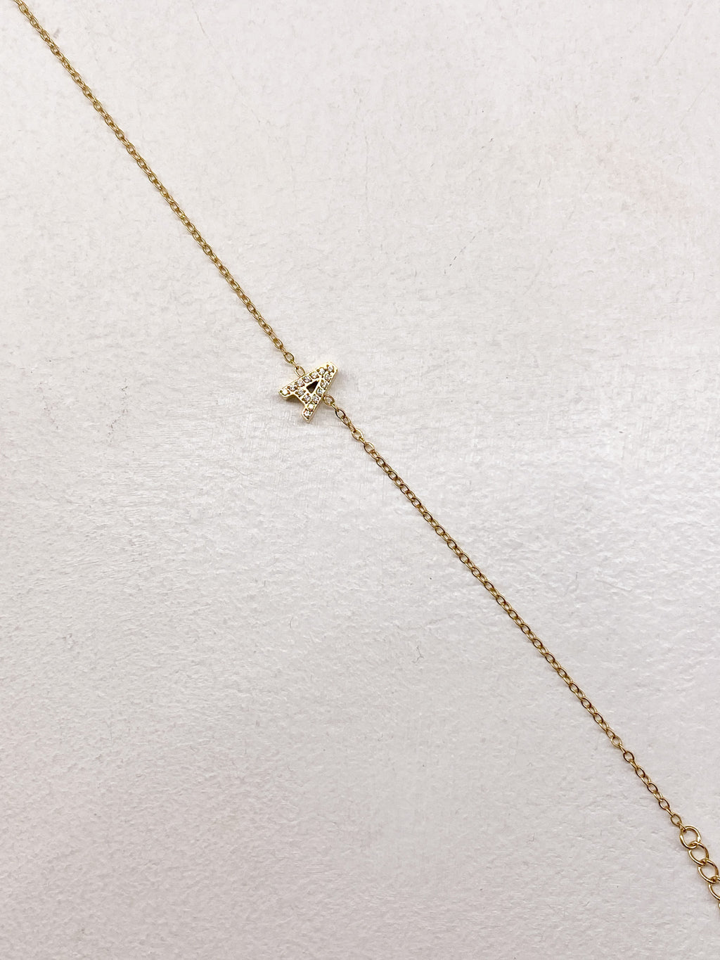 Bracelet A-Z lettre initiale acier inoxydable doré strass