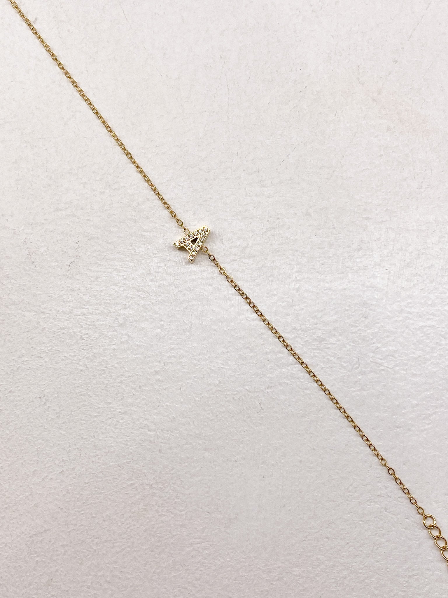 Bracelet A-Z lettre initiale acier inoxydable doré strass