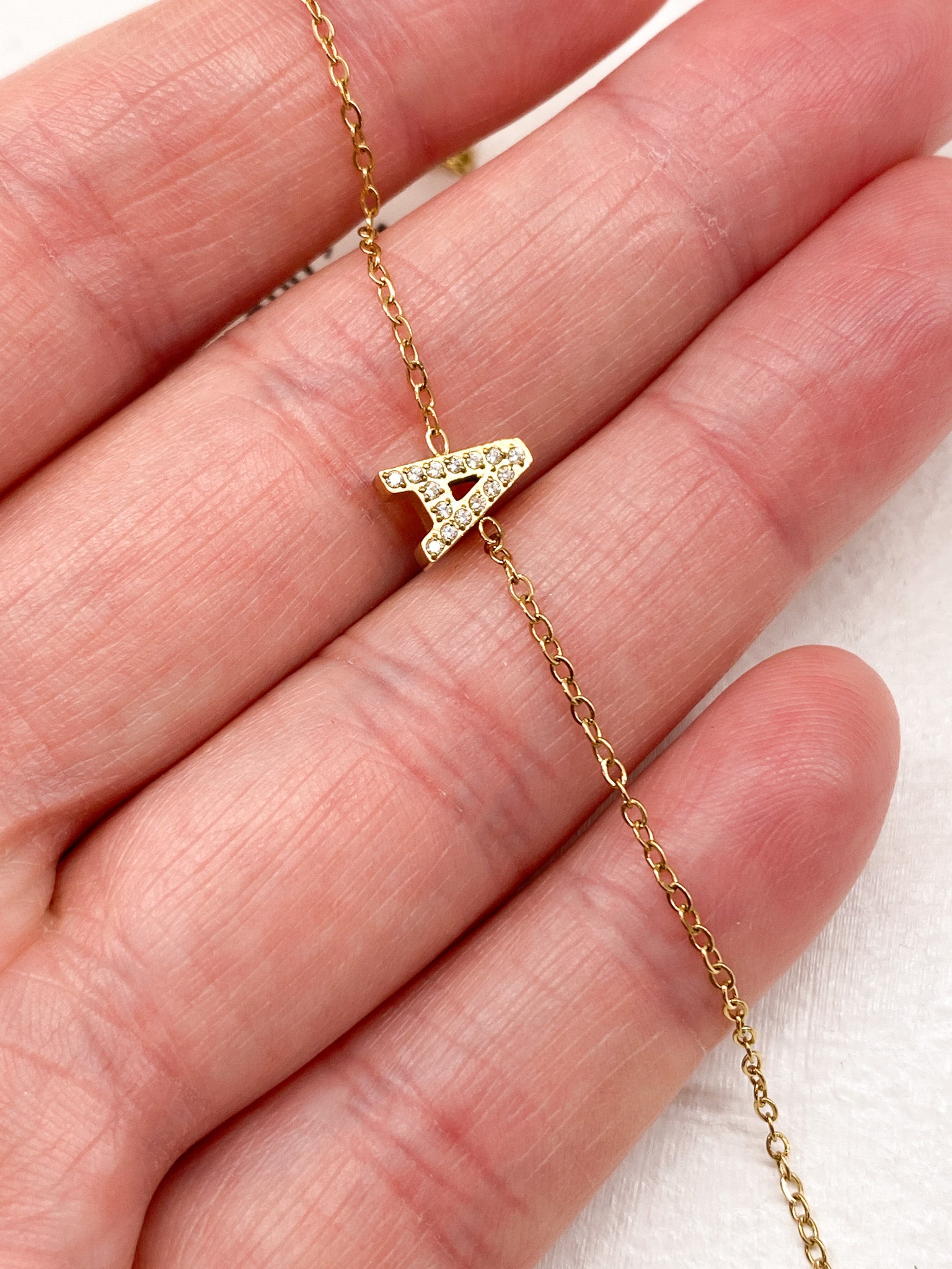 Bracelet A-Z lettre initiale acier inoxydable doré strass