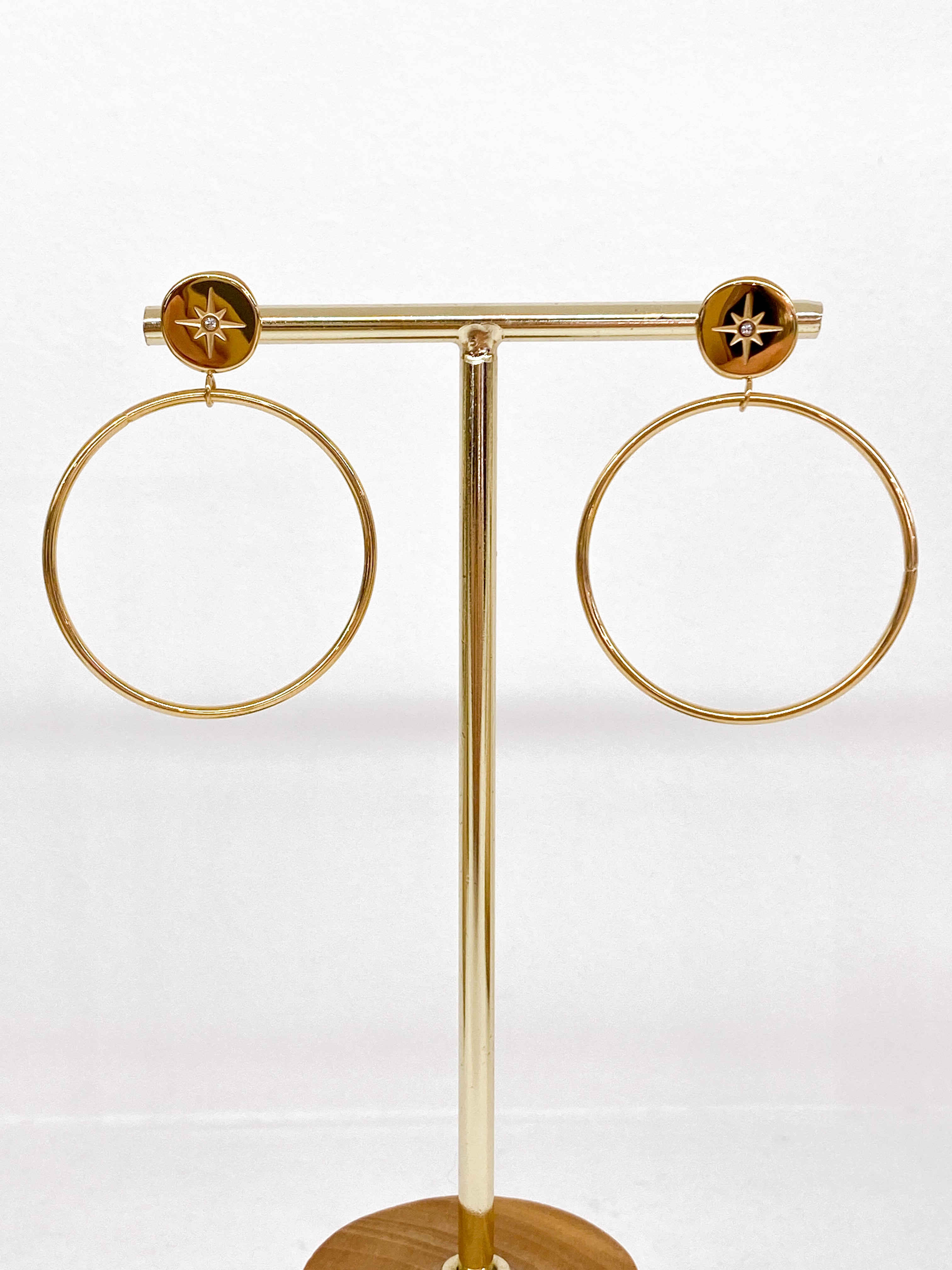 Boucles d’oreilles rondes avec étoile polaire strass