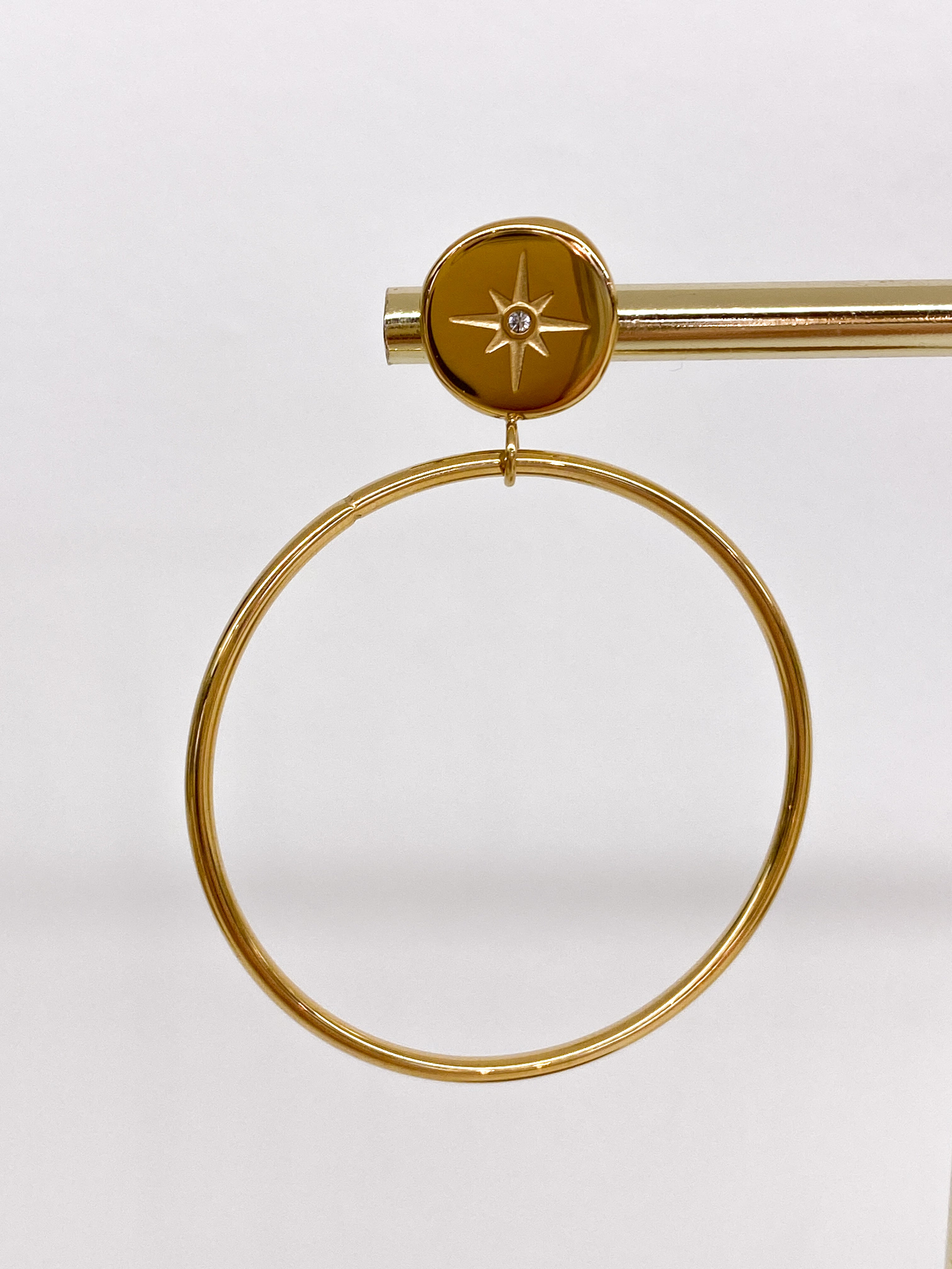 Boucles d’oreilles rondes avec étoile polaire strass
