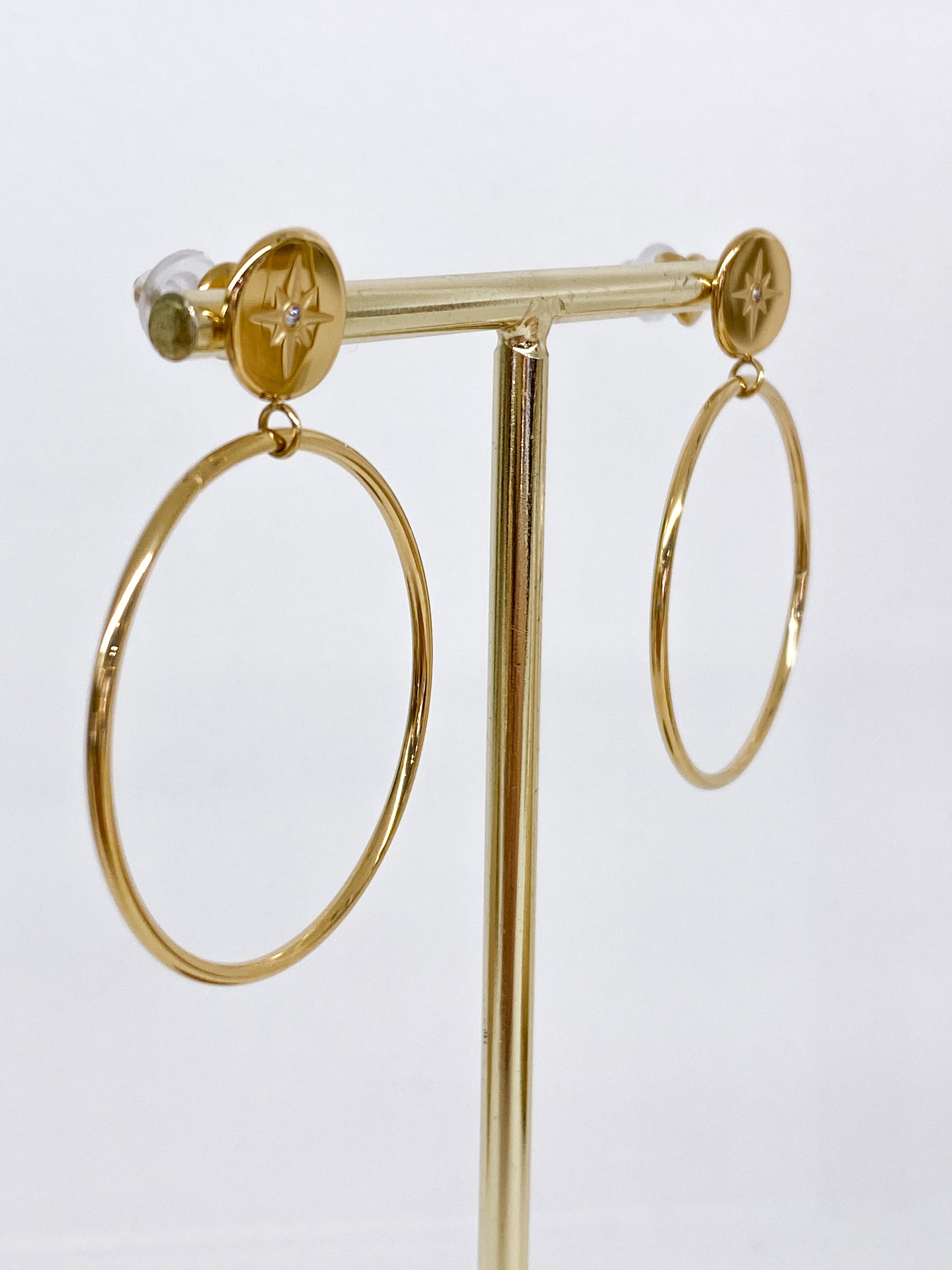 Boucles d’oreilles rondes avec étoile polaire strass