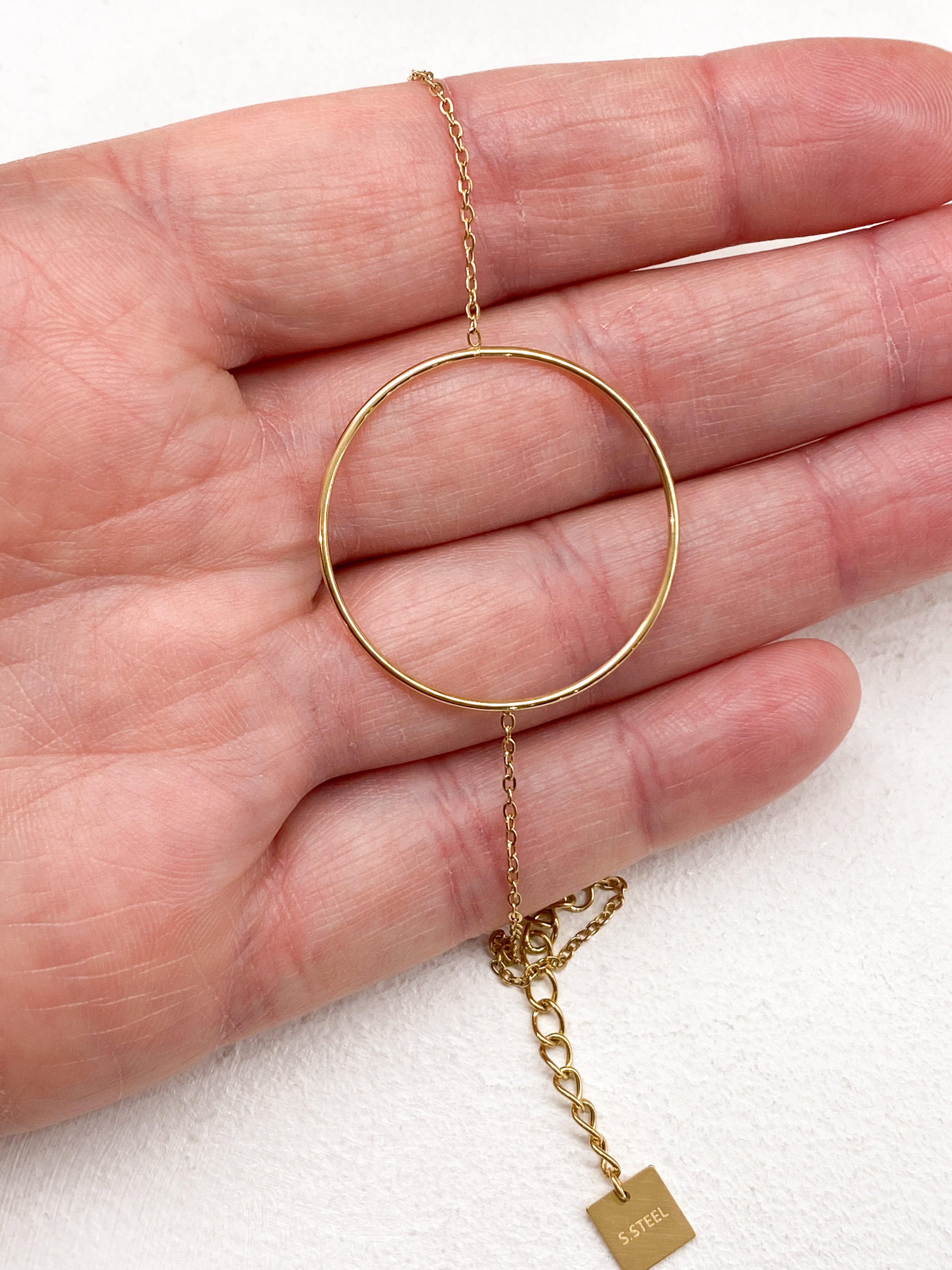 Bracelet grand anneau doré ou argenté