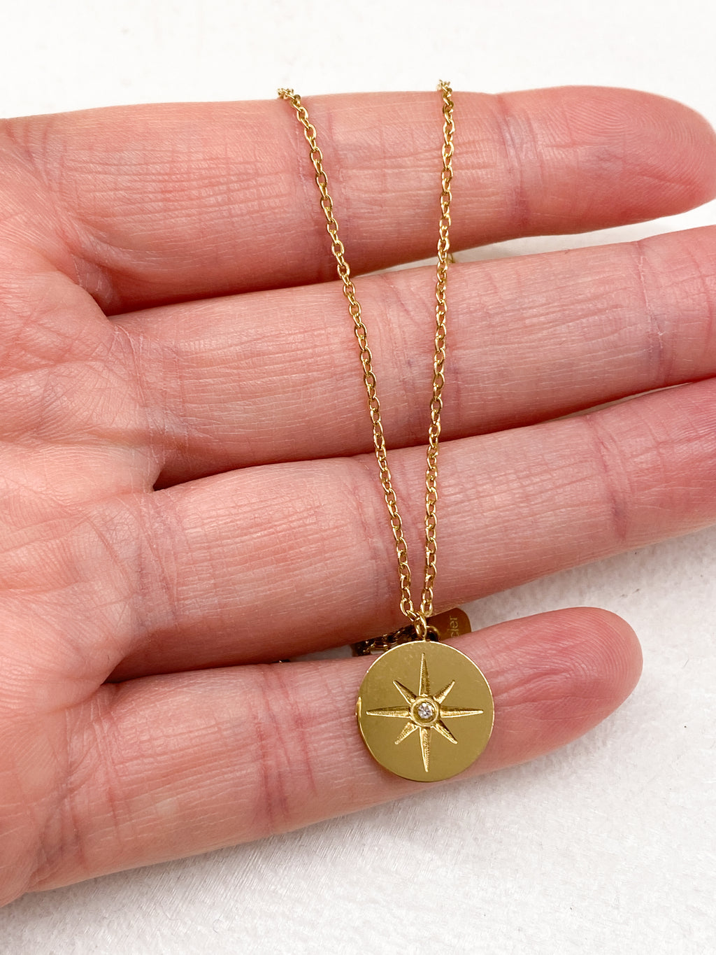 Collier médaille étoile polaire avec strass en acier inoxydable