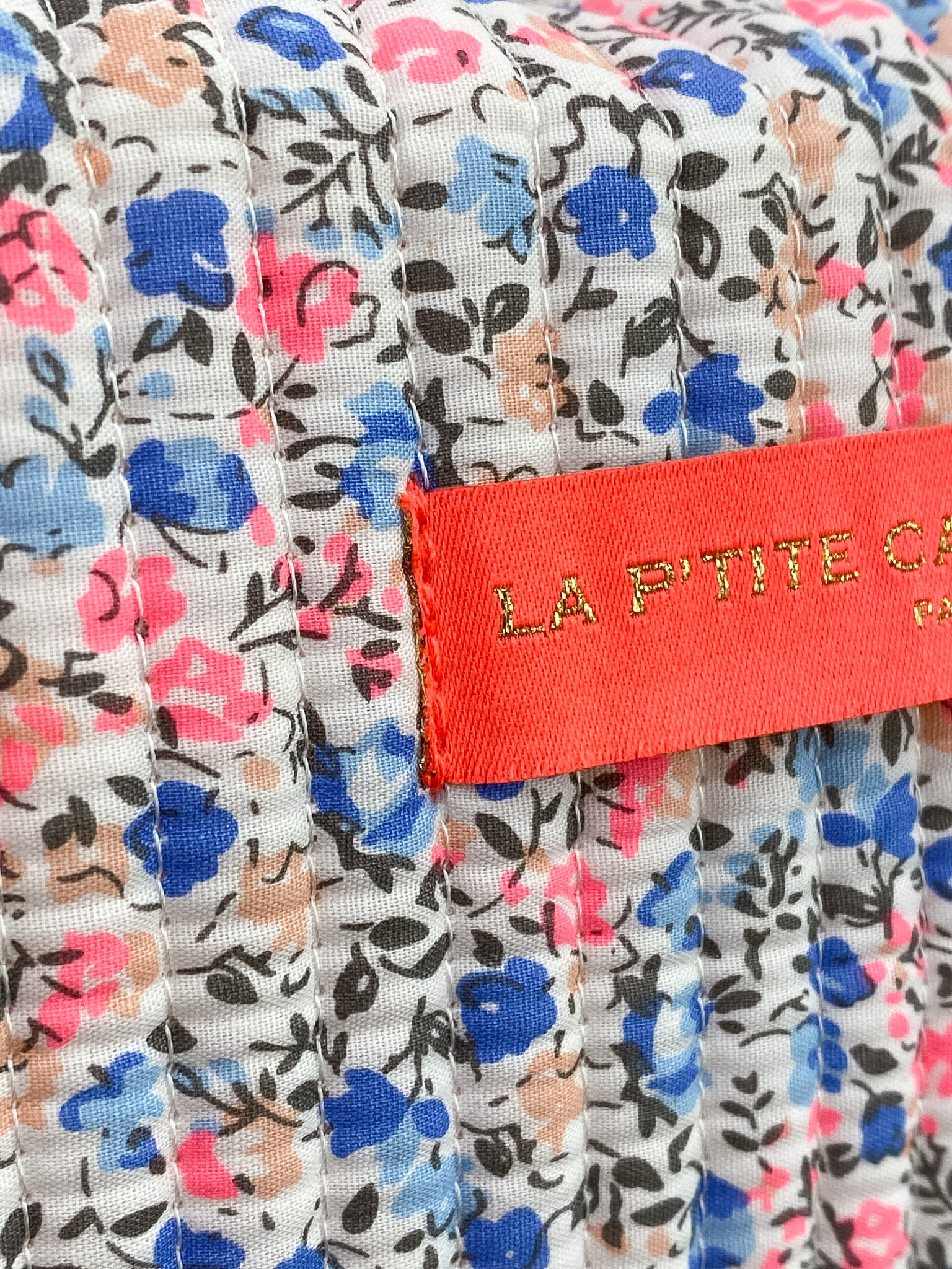 Trousse matelassée fleurie en coton
