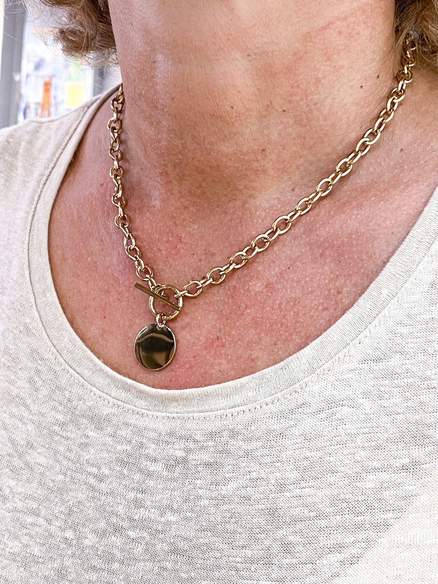Collier chaîne épaisse avec médaillon rond